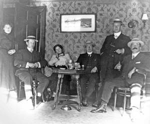 Billy Meikle (right) and friends, in The British Oak pub, Lichfield Street, Walsall, c1910.  (Walsall LHC) 